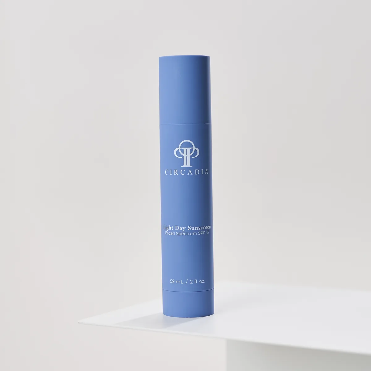 Light Day Sunscreen Broad Spectrum SPF 37 by Circadia, on a white pedestal