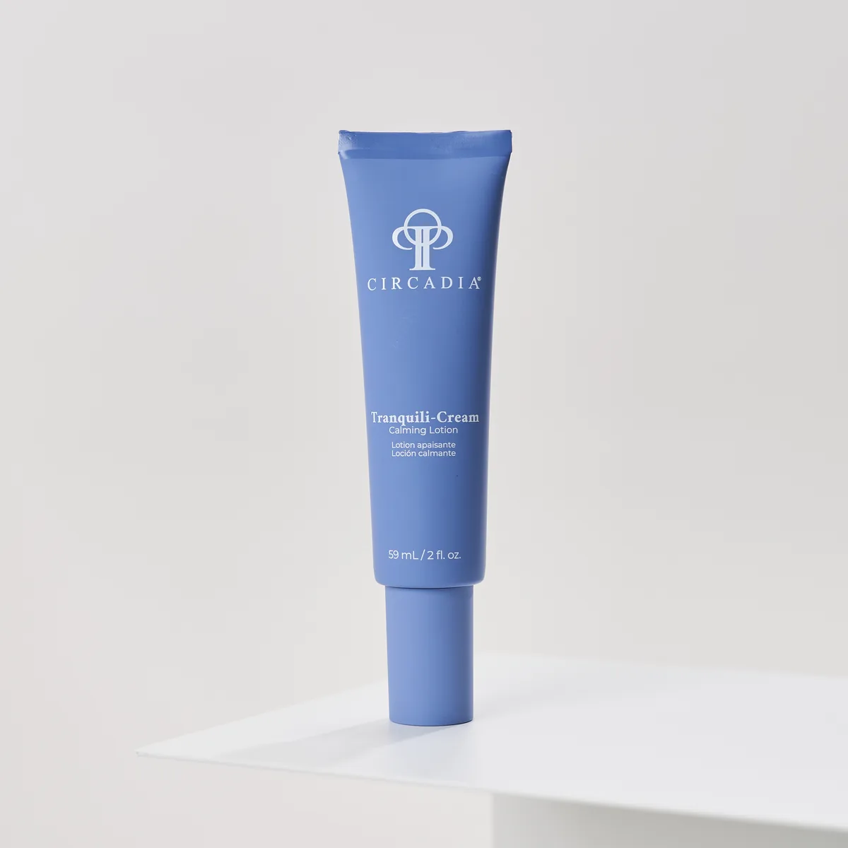 Tranquili-Cream Calming Lotion by Circadia, on a white pedestal