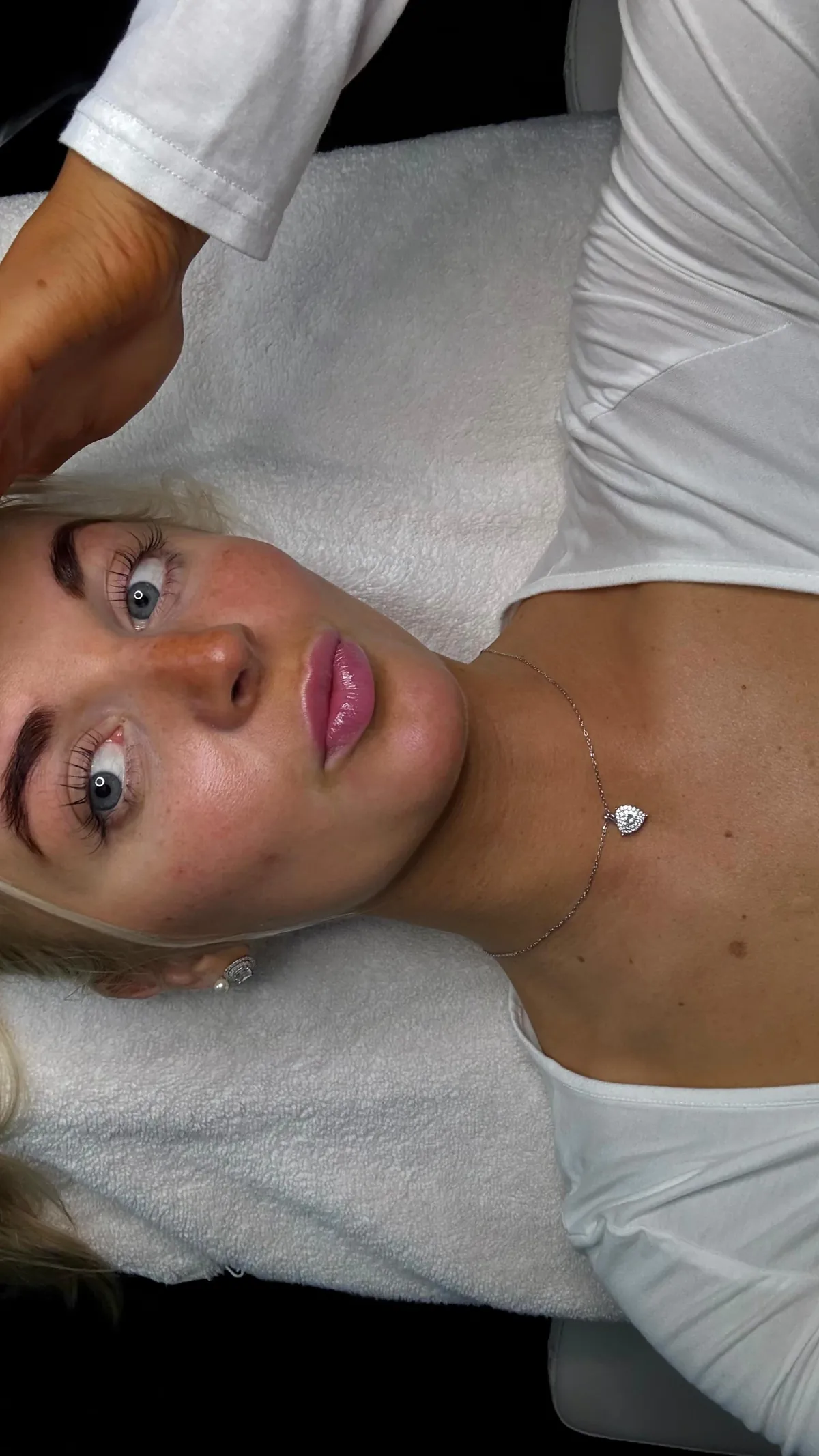 A client relaxing during a facial at KRIDO Wellness.