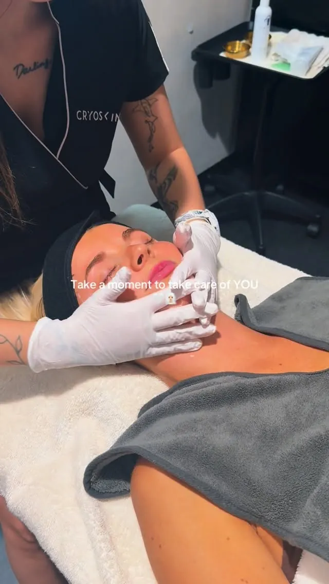 Hands at work during a facial.