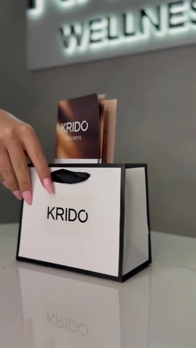 A KRIDO gift bag at the front desk.